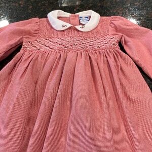Carriage Boutique red Smocked Dress with White Collar. Perfect for the holidays!